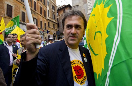 epa02778716 National president of Italy''s ecological party Verdi, Angelo Bonelli joins supporters in Pantheon Place, Rome 13 June 2011 following the result of the referendum on nuclear power. The inscription reads Thank You, Italy. although final results are expected later in the day, a majority of Italians appeared to have rejected the re-introduction of nuclear power in the country. EPA/MASSIMO PERCOSSI